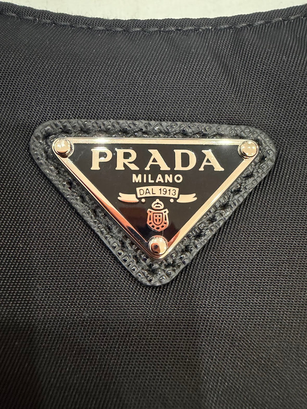 Prada Re-Edition 2005 Mini Borsa in Re-Nylon e Saffiano Nera