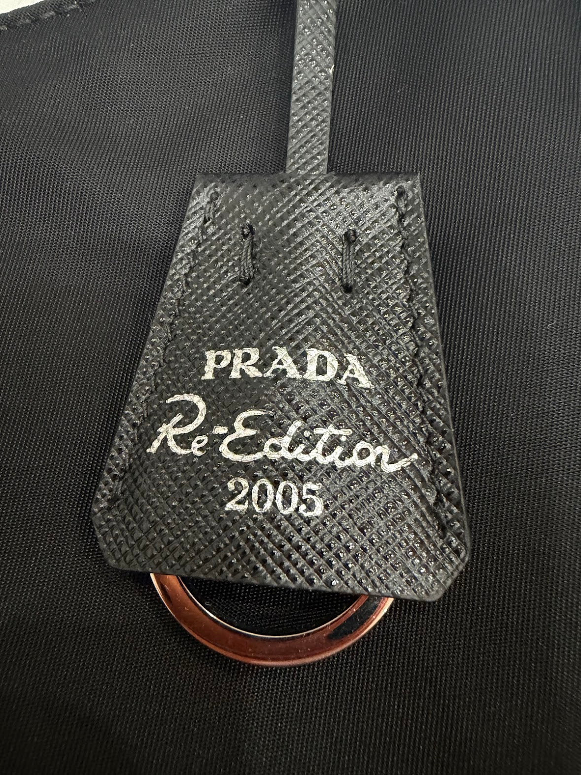 Prada Re-Edition 2005 Mini Borsa in Re-Nylon e Saffiano Nera